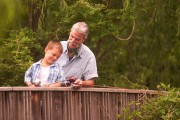 Grandfather and grandson fishing