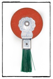 Red and silver EBERHARD Van Dyke pencil sharpener with green bristles.