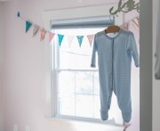 Baby bodysuit on hanger